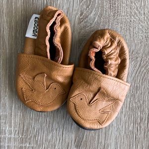 Brown booties with doves